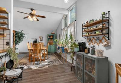 Bright and airy dining area featuring ample natural light and a cozy atmosphere for gatherings.