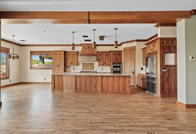 Arts & Crafts inspired kitchen featuring solid wood cabinetry, quartz surfaces, and refined detailing. This Phoenix kitchen blends timeless design with modern functionality.