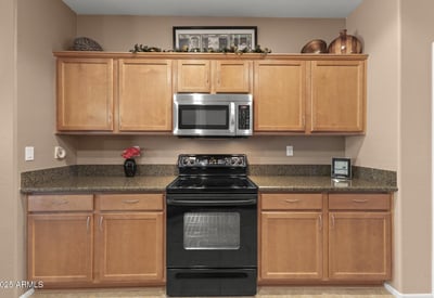 Featuring granite countertops, maple cabinets, and stainless appliances, this kitchen is designed for today s home chef with plenty of workspace.