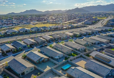 Dramatic aerial photo showcasing the community s stunning natural backdrop and well-kept homes. The setting offers a peaceful lifestyle with mountain views.