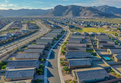 Aerial shot that showcases community greenbelt access along with well-maintained homes. Perfect for buyers seeking walkability and natural beauty.