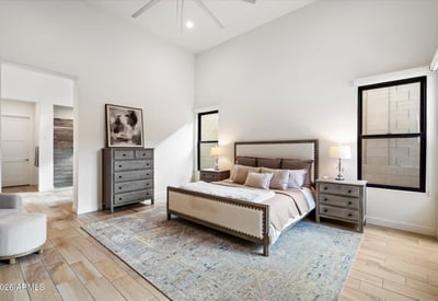 Generously sized primary bedroom with soft natural light and neutral design elements. A calm, inviting retreat in this Scottsdale luxury home.