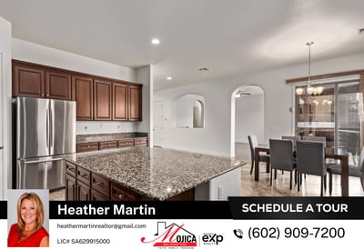 Featuring a gas cooktop, built-in microwave, and granite counters, this kitchen is designed for efficiency. The generous storage and prep space make it a standout in this Glendale pool home.