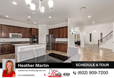 This open layout connects the kitchen to the living areas for easy entertaining. Granite countertops, recessed lighting, and modern flooring add comfort and style to this Glendale home.