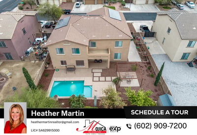 Drone view captures the pool, paver patio, and shaded pergola dining area. Solar energy features and organized outdoor layout enhance this Glendale property.