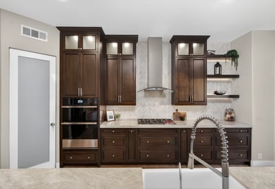 Custom kitchen with built-in oven, sleek cabinetry, and gas cooktop, offering both functionality and luxury in this Scottsdale property.