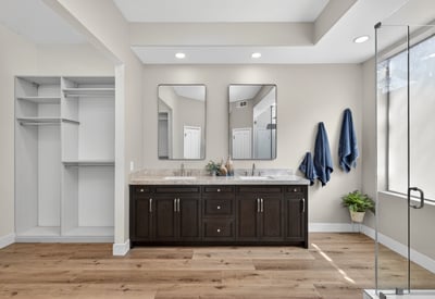 Elegant Scottsdale bathroom with dual sink vanity, quartz surfaces, and custom cabinetry, offering both luxury and convenience.