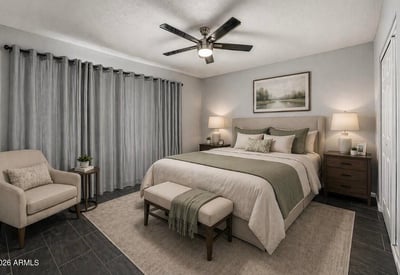 Staged bedroom showcasing layout versatility and modern design. This Sun City home emphasizes updated interiors and comfortable living.