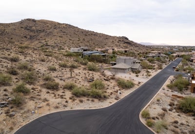 Elevated homesite featuring dramatic mountain backdrops and scenic desert surroundings. Enjoy peaceful hillside living with direct access to nearby hiking trails and outdoor recreation in Phoenix.