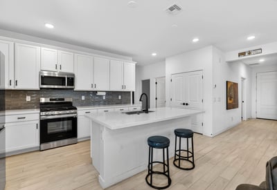 From the moment you enter, you'll appreciate the open floor plan connecting the spacious kitchen, dining area, and great room with stylish finishes, natural light, and modern design throughout.
