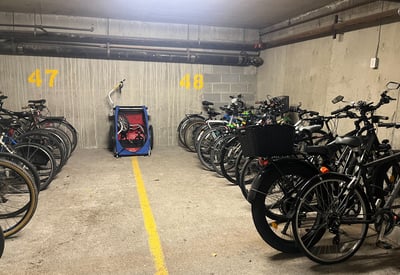 Spacious indoor bike storage with ample room for parking and maintenance, ideal for cycling enthusiasts.