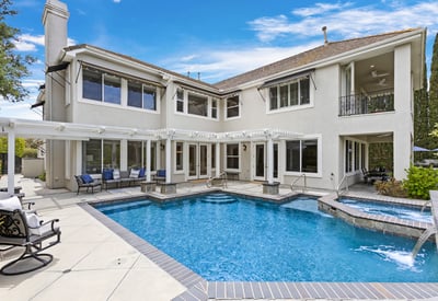 Expansive home with a stunning salt water pool, with newer pool heater and featuring tons of room to entertain