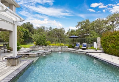 Discover your oasis with a spacious pool and scenic backyard, perfect for relaxation and outdoor entertaining.