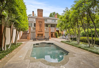 Pool with view to home, and fireplace