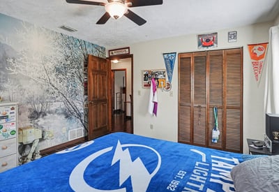 Another view of the second bedroom, looking out towards the hallway.