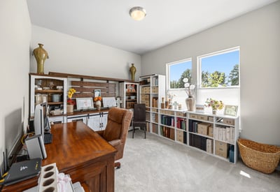 Main level bedroom used as a craft room