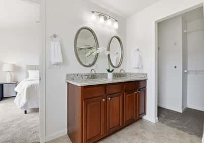 Convenient dual sinks and large walk-in closet.