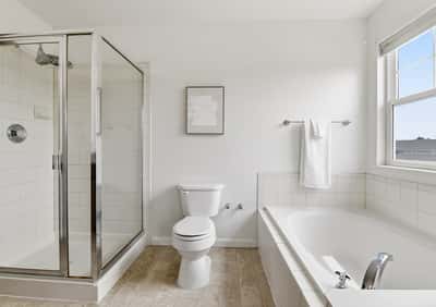 Relax in the large soaking tub and standalone shower.