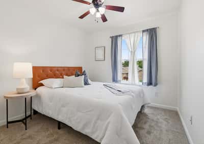 Secondary bedroom perfect for family or guests.