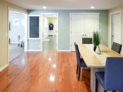 Bright and inviting open-concept dining area flows seamlessly into additional versatile living spaces.