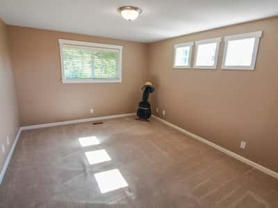 Bright and airy room with natural light, perfect for personalizing and making your own.