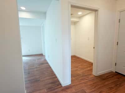 Hallway View to Fam Rm & Laundry Rm
