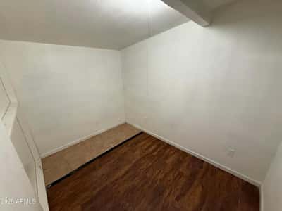 Dedicated flex room perfect for a home office, study area, or creative workspace. Featuring wood-look flooring and a private layout, this room offers excellent functionality and flexibility.