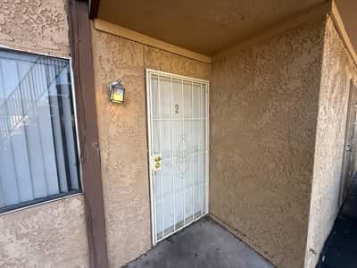 Private covered entry with security door creates a welcoming first impression while providing additional privacy and functionality. A practical feature that enhances everyday living.