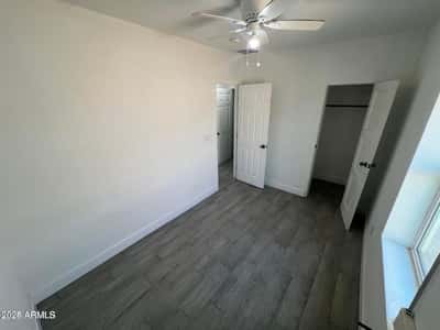 Featuring multiple closets, updated flooring, and a spacious layout, this bedroom combines functionality and comfort. The move-in-ready design offers flexibility for a variety of lifestyles.