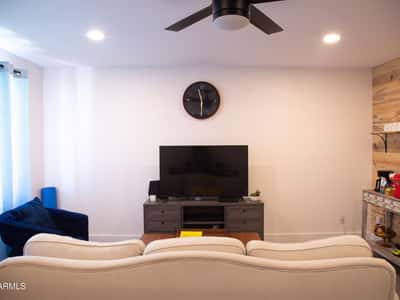 The open-concept great room combines comfortable living and dining spaces with updated flooring and modern finishes. This remodeled condo delivers a bright and welcoming atmosphere ideal for everyday living.