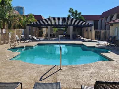 The sparkling community pool offers residents a refreshing place to cool off, exercise, or relax. Surrounded by comfortable seating and attractive landscaping, it serves as a centerpiece amenity.