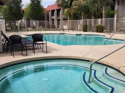 Enjoy resort-style living with access to both a community pool and spa. These amenities provide opportunities for relaxation, recreation, and socializing within a beautifully maintained setting.