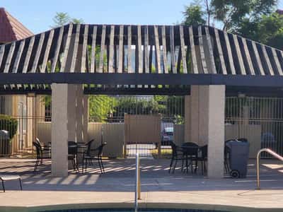 The covered pavilion offers a comfortable shaded retreat adjacent to the pool area. This inviting community feature enhances outdoor enjoyment and supports an active Tempe lifestyle.