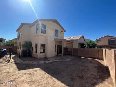 Relax and unwind under the covered patio while enjoying a spacious backyard designed for low-maintenance living. The open outdoor space offers room for gatherings, play areas, future landscaping improvements, or personalized outdoor features.