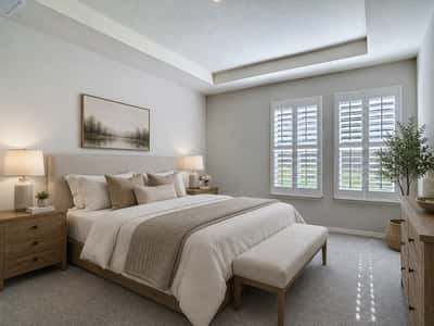 Spacious bedroom featuring natural light, modern finishes, and a cozy atmosphere for ultimate relaxation.