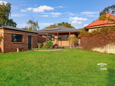 Spacious outdoor area complements this inviting property, perfect for relaxation and entertaining in a family-friendly neighborhood.