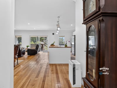 Spacious entryway leads to an inviting living area with ample natural light and modern features.