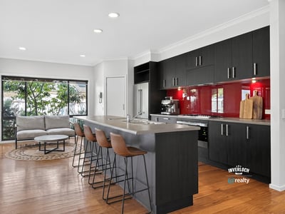 Contemporary kitchen featuring sleek cabinetry, a spacious island, and an open layout perfect for entertaining.