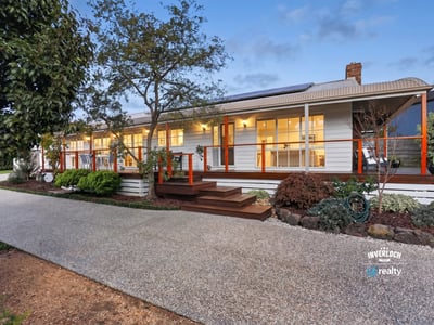 This inviting home features spacious outdoor areas and modern amenities, perfect for comfortable living and entertaining.