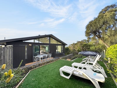 Contemporary home featuring lush outdoor space, perfect for entertaining and enjoying scenic views.