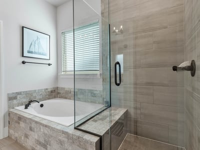 Soaking Tub and Glassed in Shower with Built-in Bench