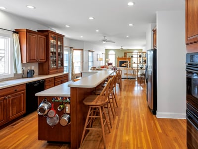 Entertaining is a breeze with a double oven, ample seating at the Island and separate dining area, and open layout to the Family Room.