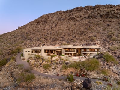 This stunning estate on a private hillside presents sweeping desert vistas, impeccable finishes, and architectural grandeur. A rare opportunity to own a home that captures the essence of luxury living in Paradise Valley.