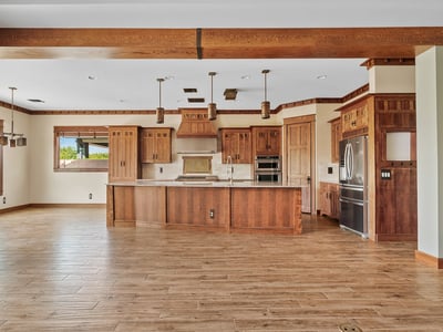 Arts & Crafts inspired kitchen featuring solid wood cabinetry, quartz surfaces, and refined detailing. This Phoenix kitchen blends timeless design with modern functionality.