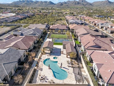 Resort-inspired community pool and spa area designed for relaxation, socializing, and enjoying sunny Cave Creek days.