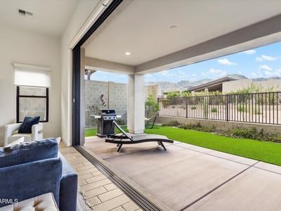Private side yard featuring desert landscaping and clean lines. Enhances the overall outdoor functionality of this Scottsdale residence.