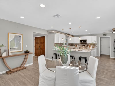 Dining space seamlessly connected to the kitchen and living areas, enhancing openness and natural light.