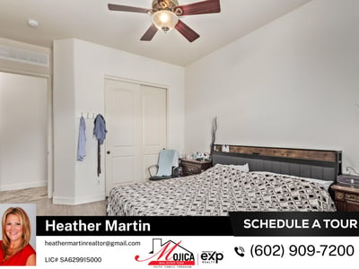 Large enough for a sitting area, this primary bedroom offers neutral finishes and modern updates. A peaceful retreat within this Glendale property featuring energy-efficient design and open living spaces.