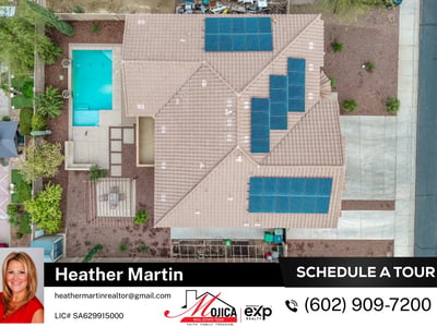Aerial perspective showcases the wide driveway, RV gate, and tile roof with solar panels. Located in Glendale, this home offers strong curb appeal and modern efficiency.