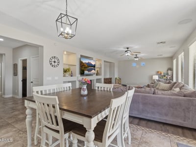 Dining space positioned between the kitchen and great room, allowing seamless flow for meals, gatherings, and entertaining.